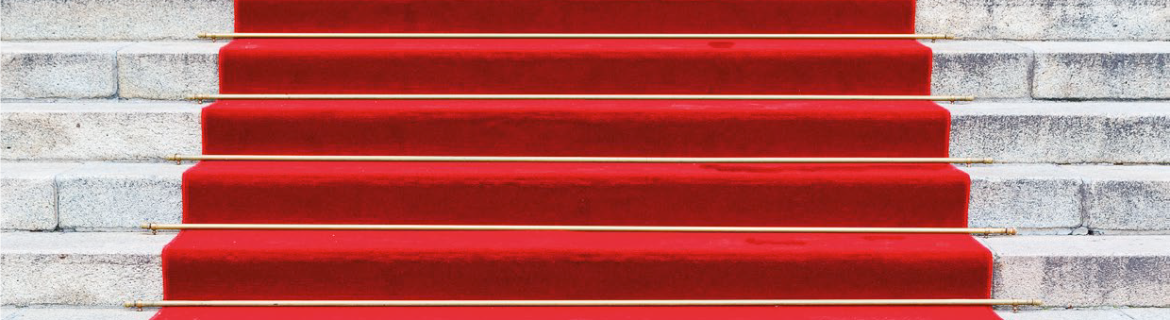 Symbolbild industriebaupreis: roter Teppich